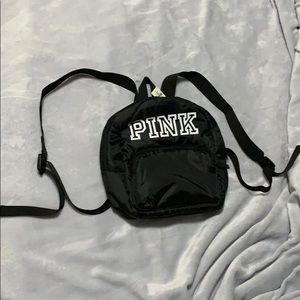 A Black Victoria's Secret Mini Pink Backpack